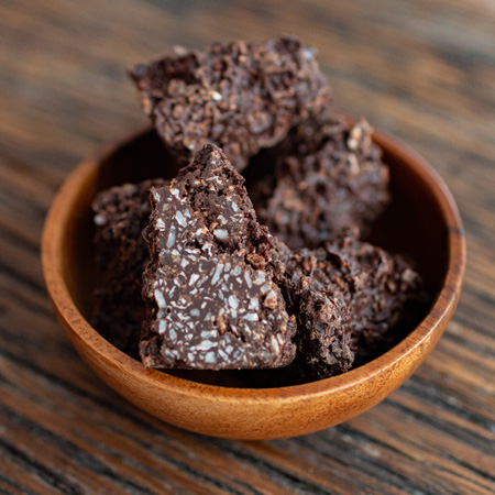 Кокос в темном шоколаде фото