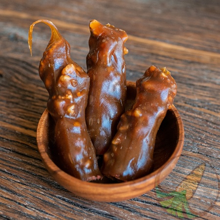 Чурчхела с грецким орехом и курагой в виноградном соке фото